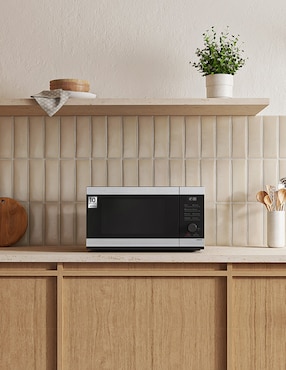 Horno de microondas convencional Samsung modelo MS32DG4504ATAX 1.1 pies cúbicos